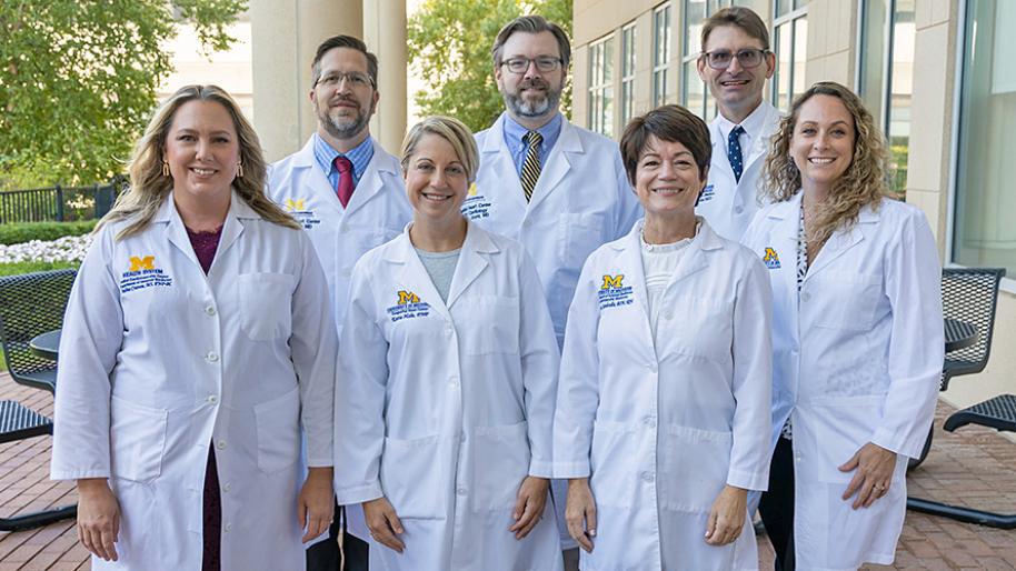 U-M Health Adult Congenital Heart team showing 4 women and 3 men wearing white clinical jackets