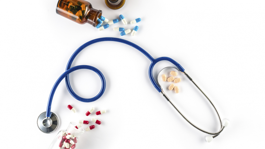 Assorted pills and stethoscope