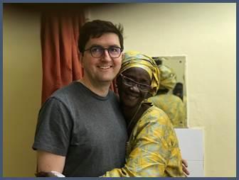 A patient hugging Thomas Crawford, M.D. in Africa