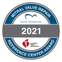 MItral Valve Repair Reference Center Award 2021 from Mitral Foundation and American Heart Association: blue "O" shape with white center with Mitral Foundation and AHA logos